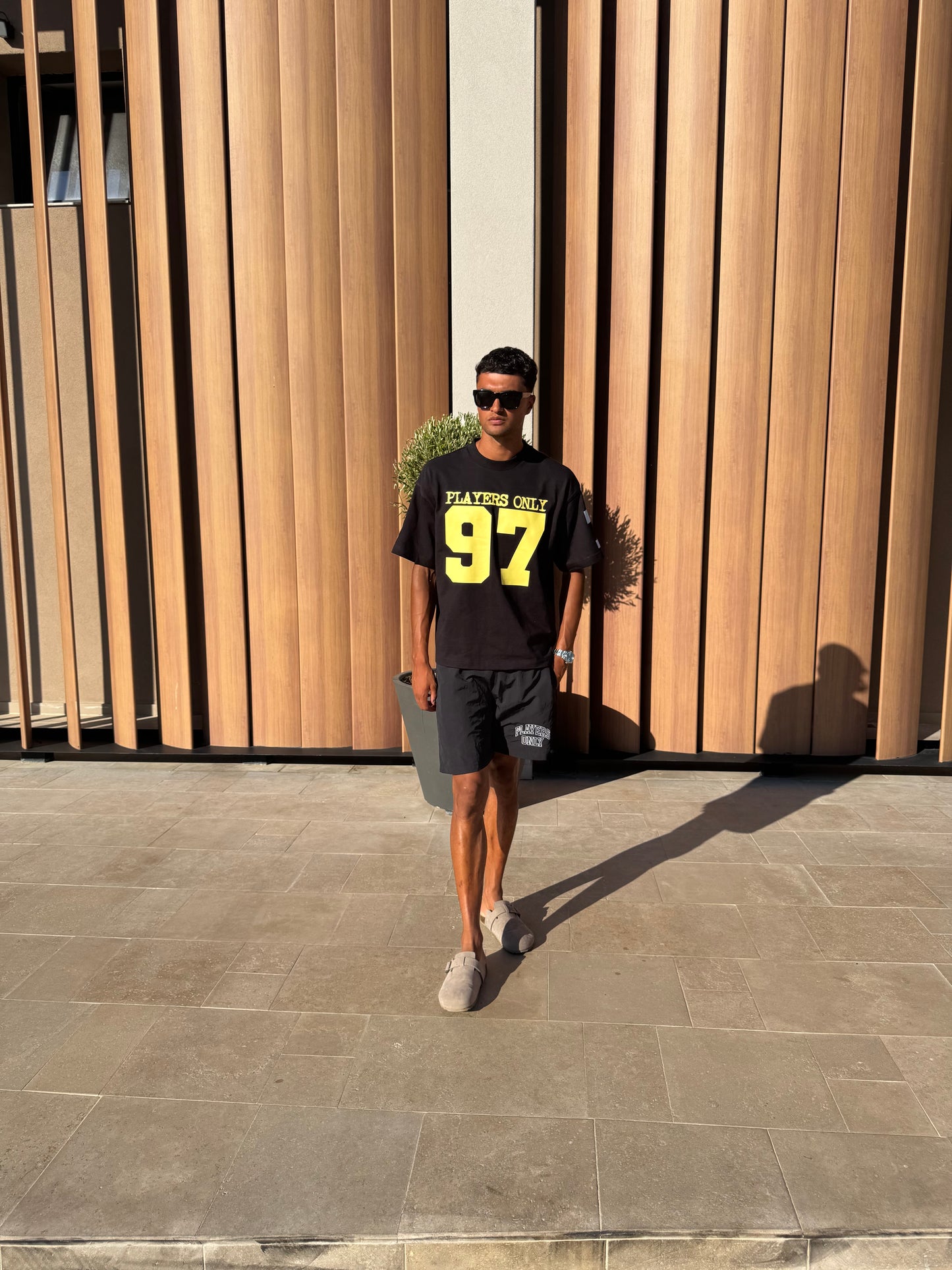 BLACK VARSITY TEE